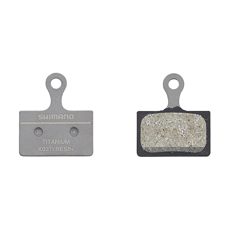210478-03::0::210478-03::Shimano, Type K, Plaquettes de freins à disque, Forme: Shimano K-Type/L-Type, Résine, Paire, IBPK05TIRXA