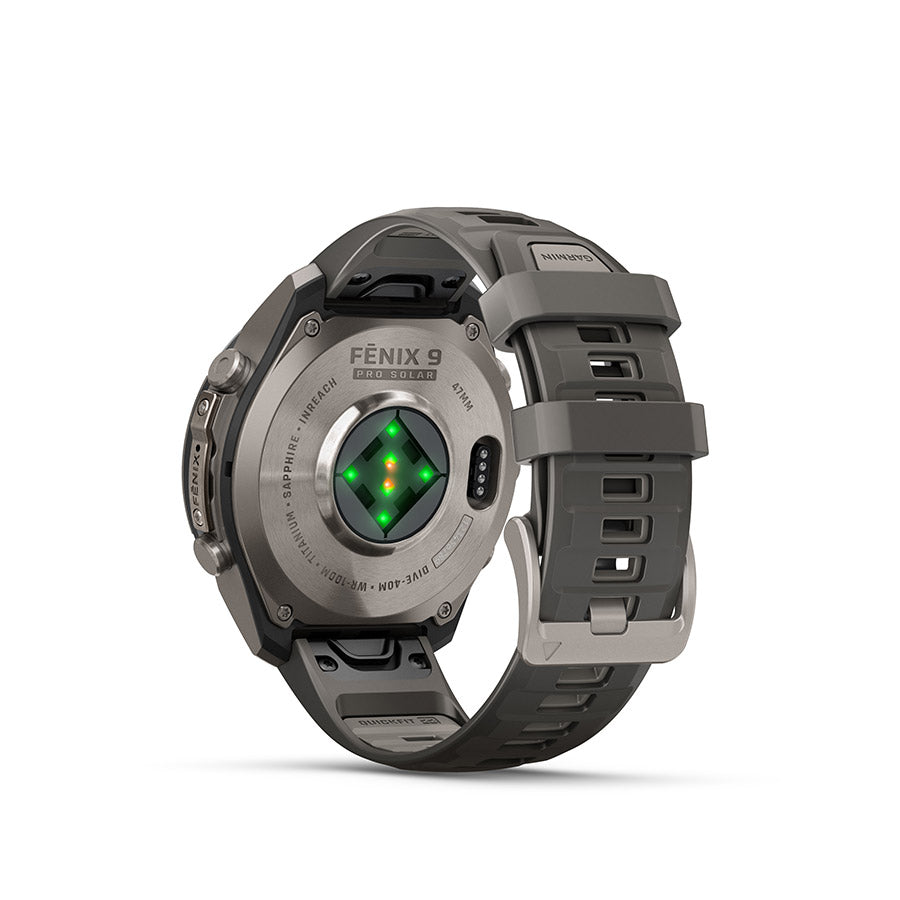 650574-01::2::650574-01::Garmin, fenix 9 Pro inReach Solar 47mm, Montre, Couleur de la montre: Titane, Bracelet: Gris galet/ Gris argent - Silicone