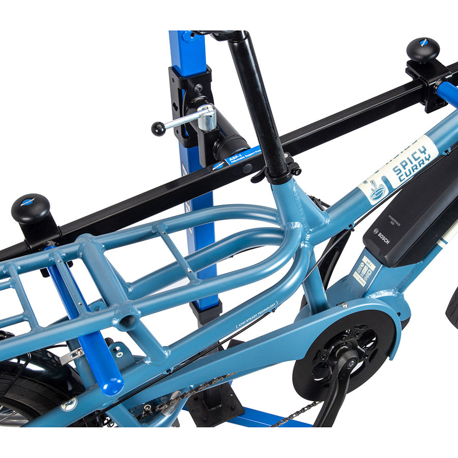 902939-01::13::902939-01::Park Tool, ASF-1, Support ajustable pour pied de réparation, Procure 2 points de support sur tout type de vélo