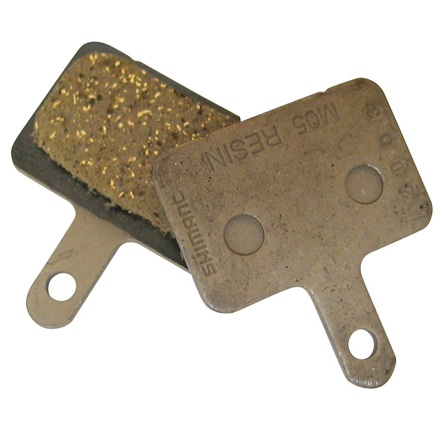 210011-02::0::210011-02::Shimano, M05 Type B, Plaquettes de freins à disque, Forme: Shimano B-Type, Résine, Paire, IBPM05RXA