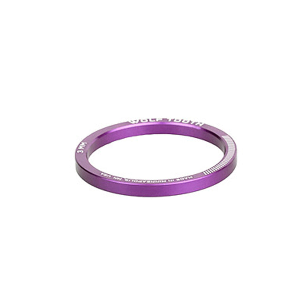 WO-SPACER-PRU-3MM::0::WO-SPACER-PRU-3MM::#WOLF TOOTH HEADSET SPACER ULTRAVIOLET 3MM